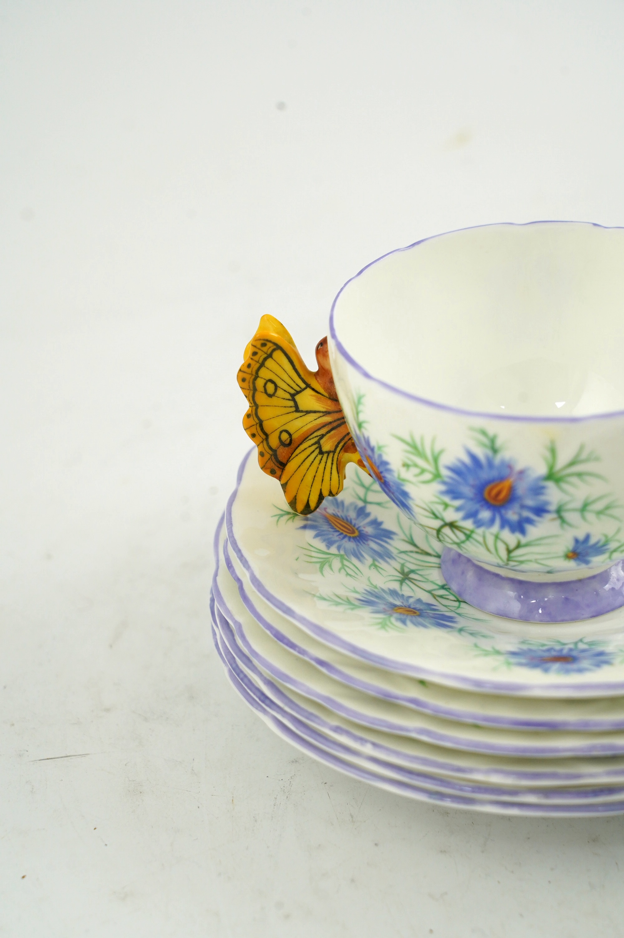 An Art Deco Aynsley cornflower pattern bone china twenty piece part tea set with butterfly handles